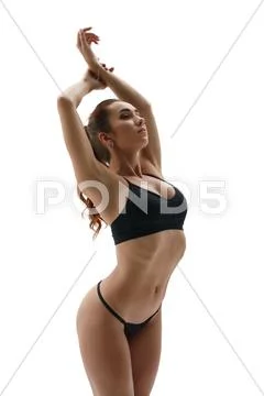 Shaping. Slim girl straightened gracefully Stock Photos