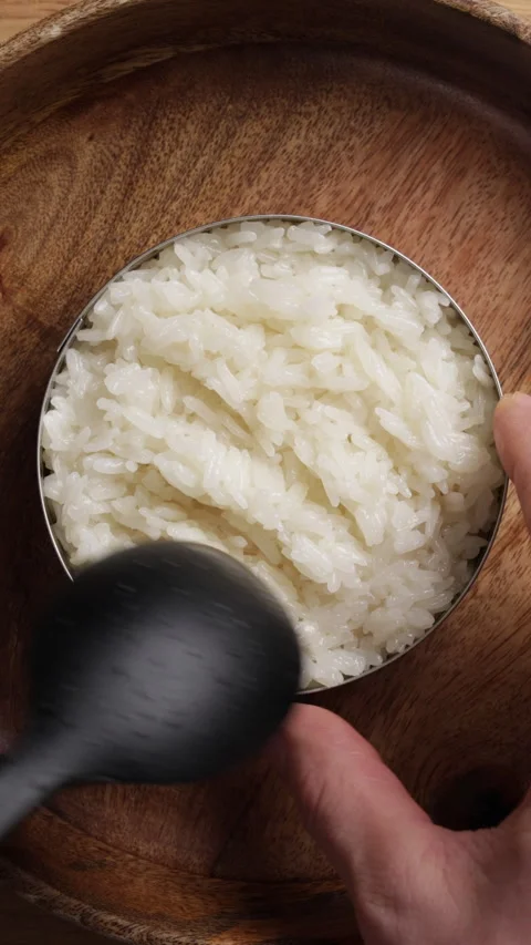 Shaping Sticky Rice On Plate Vertical Close Up Top View 스톡 동영상 335081886