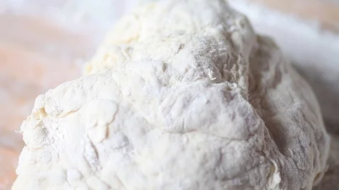 Shaping yeast dough Stock Footage 75420599