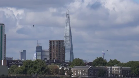 The Shard and high ride blocks from Greenwich in London, England, zoom out Stock Footage 112976381