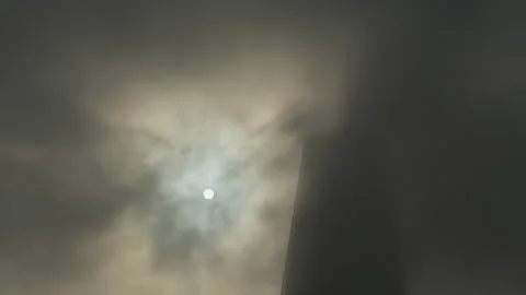 The Shard in London with dramatic moody clouds and mist moving and the sun Stock Footage 144231231