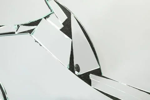 Shards of broken mirror on dark background, top view Foto stock