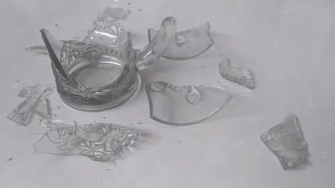 Shards of glass scattered around Stock Footage 296053577