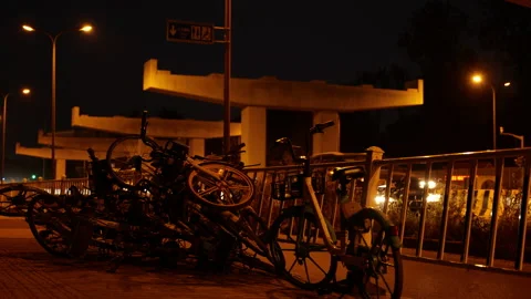 Shared bicycles at random along the road in Shanghai Stock-Footage 142913436
