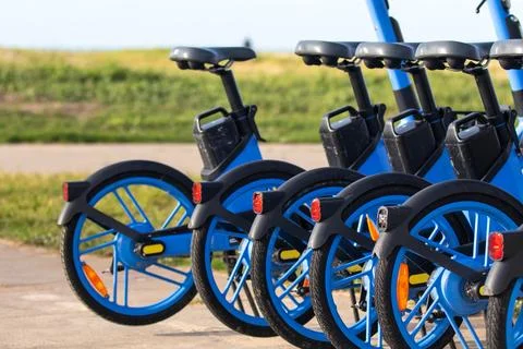 Shared electric bicycles. Stock Photos