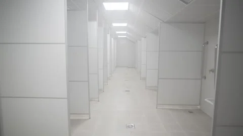 Shared shower room offers accessibility and simplicity Stock Footage 316753446