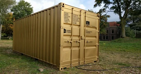 Shared studios gold shipping container on the Ede-Wageningen site Stock Footage 116876366