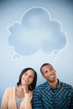 Shared thought bubble above pensive couple Fotos Stock