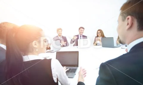 Shareholders look to the laptops and learn about the development Stock Photos