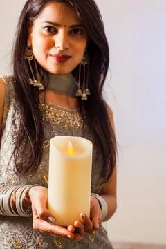 Sharing lights and warmth makes world a better place Stock Photos