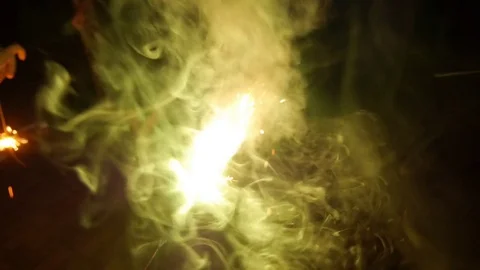 Sharing a sparkler light Video stock 83870598