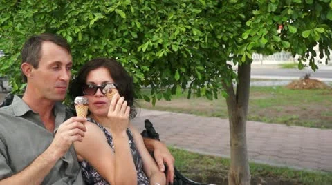 Sharing Time Together in Park Stock Footage 12019705