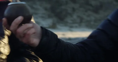 Sharing typical local tea while camping Stock Footage 90406110