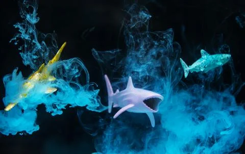 Shark figures in water with negative effect Stock Photos