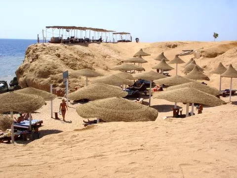 Sharm El Sheikh, Egypt - August 28, 2009 Relaxing Day at the Beach With Wic.. Stock Photos