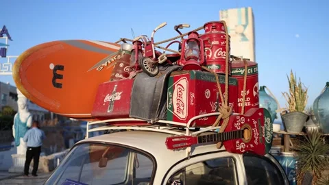 Sharm El Sheikh Egypt — May 6 2025 — Vintage Coca Cola cans guitar and old lante Video stock 311846005