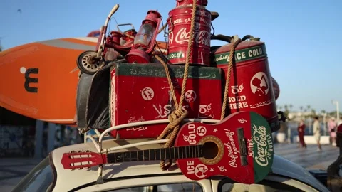 Sharm El Sheikh Egypt — May 6 2025 — Retro Coca Cola cans guitar and vintage lan Video stock 311846024