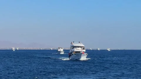 Sharm El Sheikh, Egypt - October 12, 2025: Many tourist boats in the Red Sea Video stock 328898184