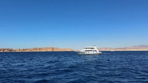 Sharm El Sheikh, Egypt - October 12, 2025: Wide shot of excursion yacht floating Video stock 328898258