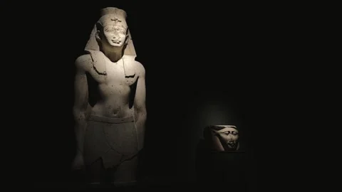 Sharm el-Sheikh, Egypt - October 9, 2025: Illuminated Seated Pharaoh Statue in Stock Footage 341994615