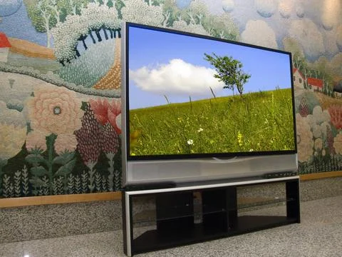 Sharp and big big plasma screen ,model released, Symbolfoto Copyright: xZo... Stock Photos
