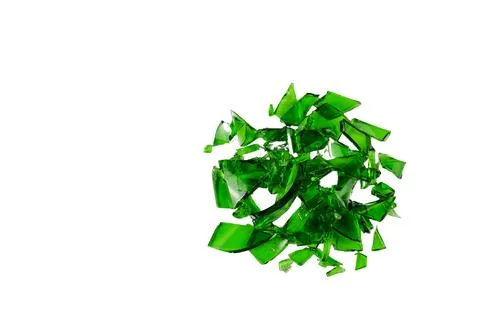 Sharp and jagged pieces of broken green glass cut out on a white background.. Foto stock