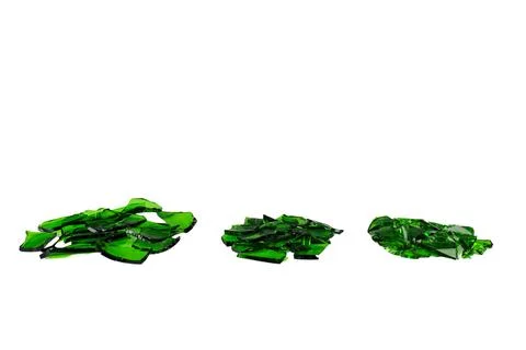 Sharp and jagged pieces of broken green glass cut out on a white background.. Stock Photos