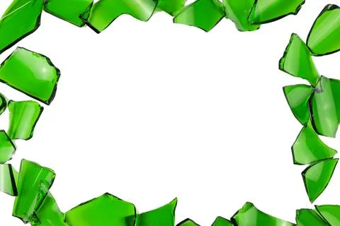 Sharp and jagged pieces of broken green glass cut out on a white background.. Stock Photos