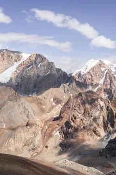 Sharp and snow-capped mountain peaks in Tajikistan Stock Photos