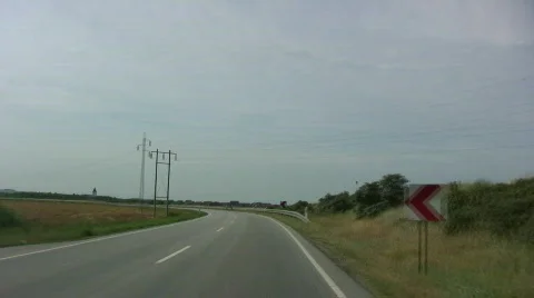 A sharp bend in a country road Stock-Footage 483834