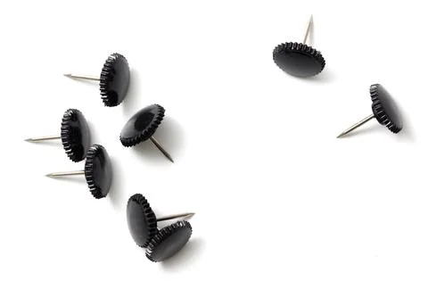 Sharp black button rivets on white background Stock Photos