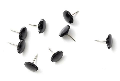 Sharp black button rivets on white background Stock Photos