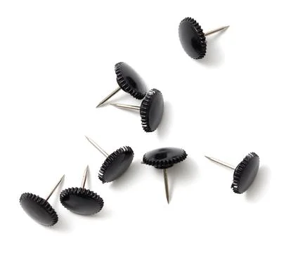 Sharp black button rivets on white background Stock Photos