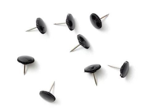 Sharp black button rivets on white background Stock Photos