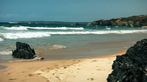 Sharp Black Rocks On Wild Beach At Sunny Day   Stock Footage 11589093