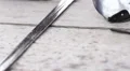 Sharp blade of steel sword and helmet with mail face mask, weapon history museum HD Footage