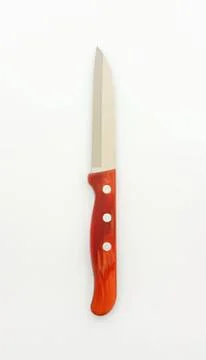 Sharp chef knife with orange handle Stock Photos