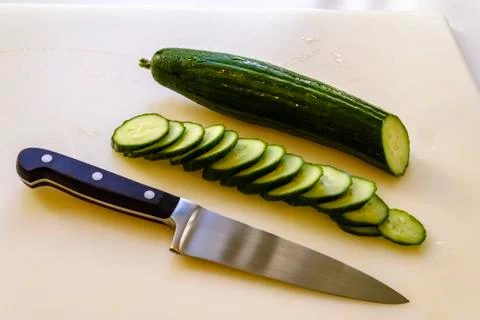 A sharp chef's knife makes cutting vegetables much easier and safer Stock Photos