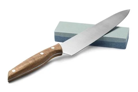 Sharp chief's knife and grindstone isolated on white Stock Photos