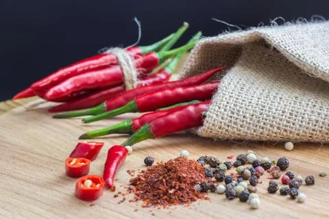 Sharp Chile pepper on a wood background, close-up Stock-Fotos