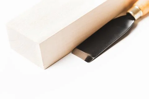 Sharp chisel with wooden bar for carving. Stock Photos