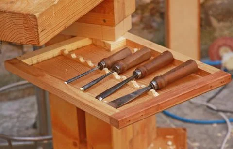 Sharp chisels and tools of an experienced craftsman Stock Photos