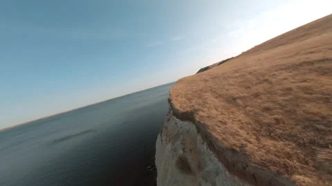 Sharp cliff on Volga river bank from cinematic fpv drone. Aerial shooting from Stock Footage 143310258