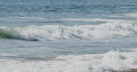 Sharp Close up of Slow Motion Footage of Waves Crashing on the Beach - Stock Stock Footage 239479552
