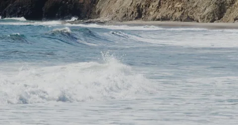 Sharp Close up of Slow Motion Footage of Waves Crashing on the Beach - Stock Stock Footage 239479771