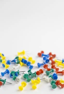 Sharp coir buttons.The concept of office pins. 库存照片