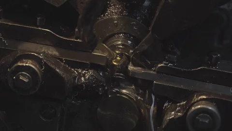 Sharp cutters in the machine in the workshop, cut off a metal rod. Close-up. Stock Footage 116077126