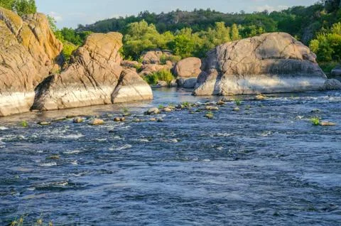 The sharp decline in the water level in the river due to the heat and activit Stock Photos