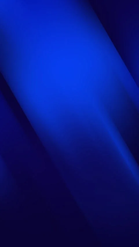 Sharp diagonal beams of blue light cut across a deep gradient background Stock Footage 314940211