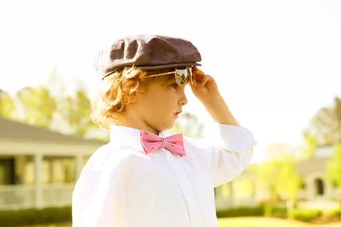 Sharp dressed boy in tweed hat at bowtie Stock Photos